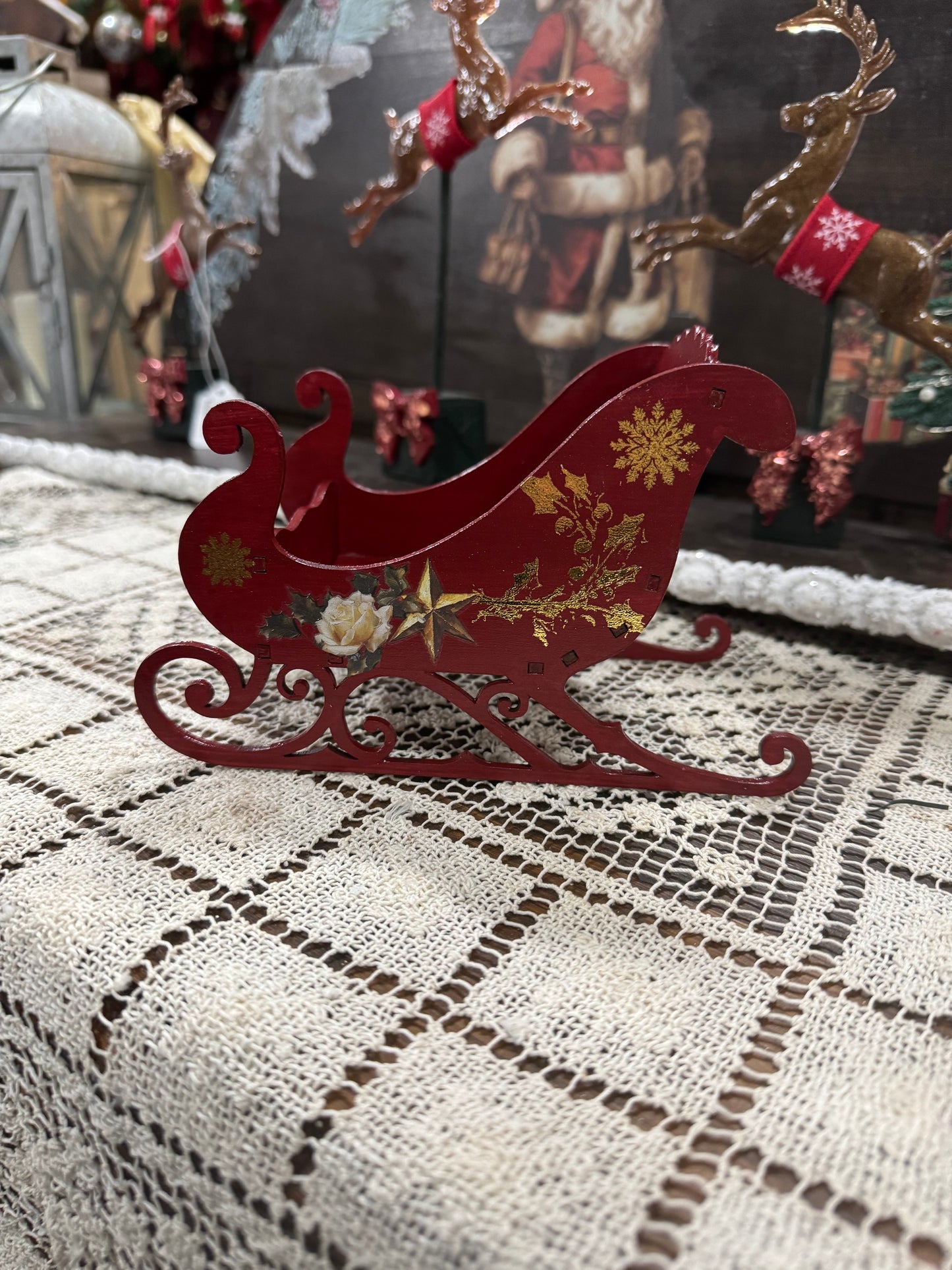 Red Christmas Santa’s Sleigh decor display Roses and flourishes