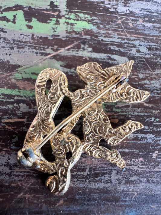 Vintage 1928 Brand Cherub and Ampersand Gold tone Brooch
