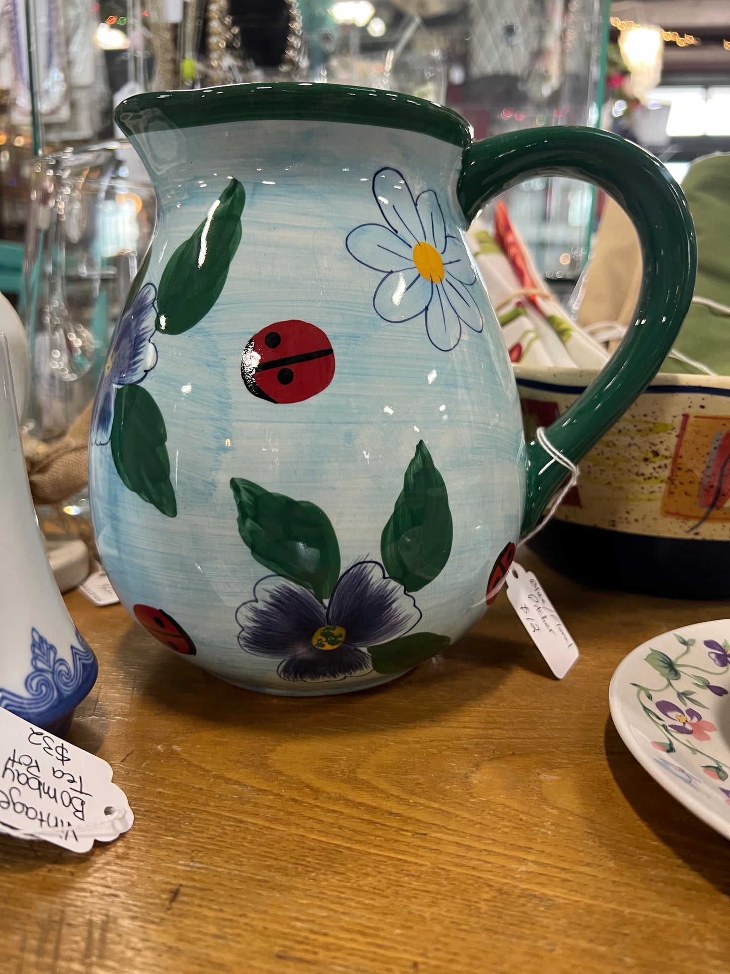 Stoneware Flowers and Lady Bug Pitcher