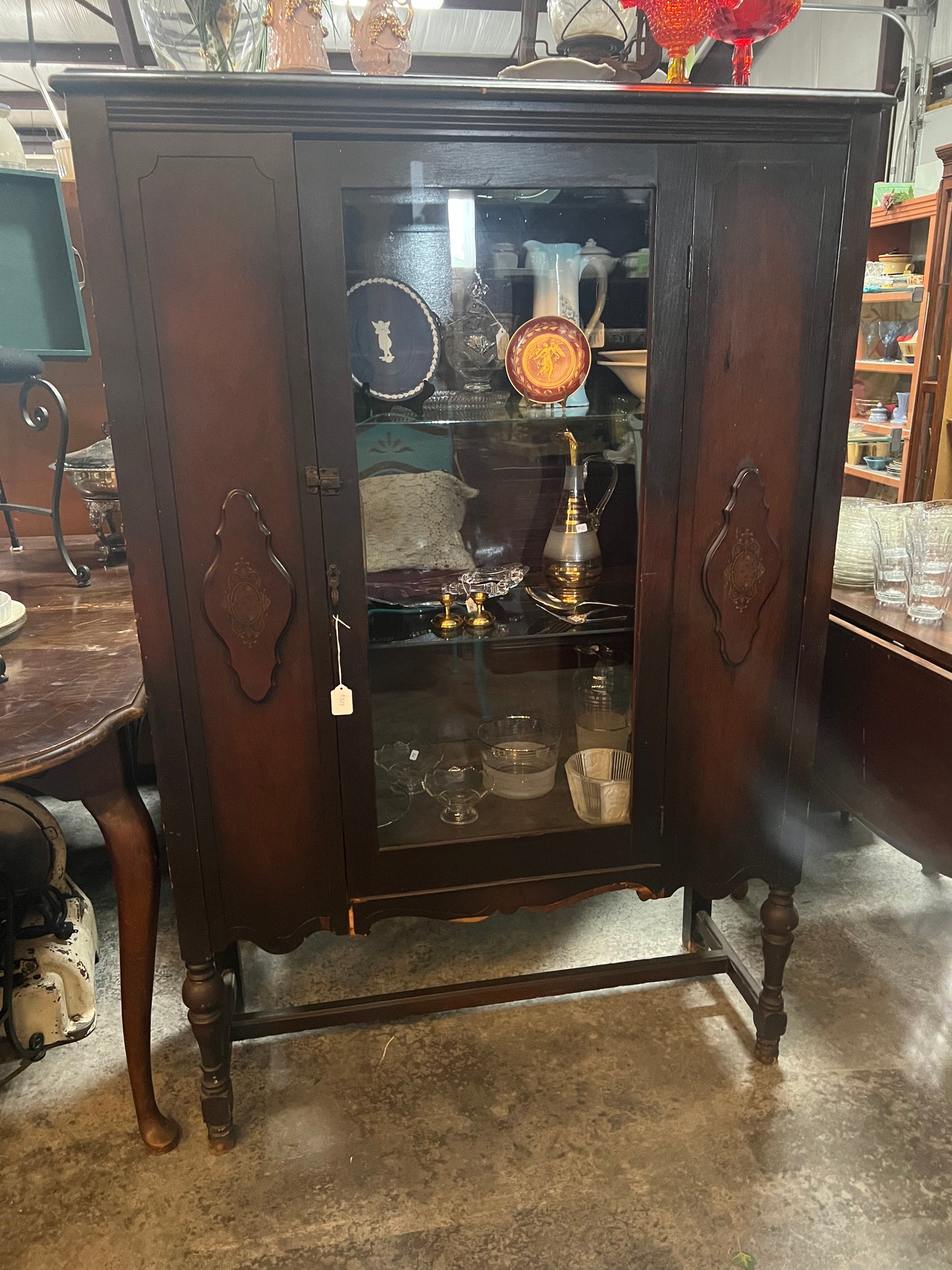 Early Century Jacobean Style China Cabinet with latch closure