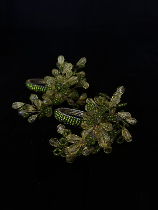 Beaded green floral inspired napkin rings